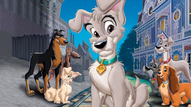 Scamp the dog from Lady And The Tramp standing on train tracks with other dogs in the background