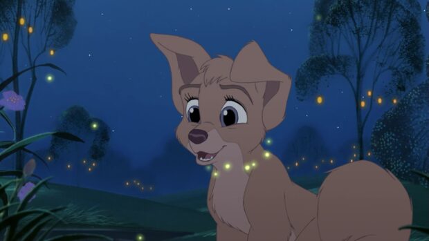 A young Lady And The Tramp character looking happy surrounded by fireflies at night