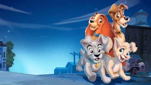 Animated dogs from Lady And The Tramp running happily at night in a town setting