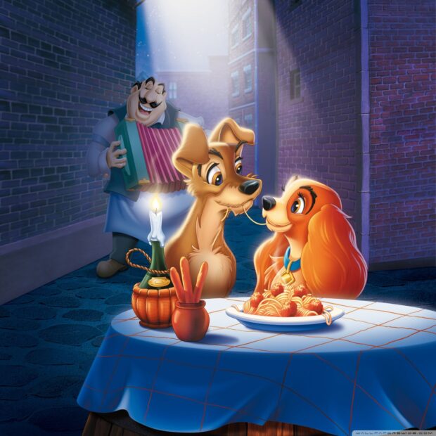 Lady and the Tramp sharing a romantic spaghetti dinner in the alley