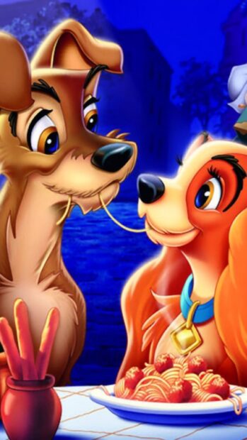 Lady and the Tramp sharing spaghetti in a romantic scene from Lady And The Tramp