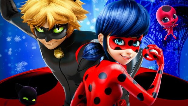 Ladybug and Cat Noir pose with a ladybug mascot in a vibrant animated scene
