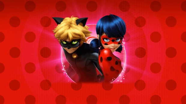 Animated characters with ladybug design standing back to back on a red background with polka dots