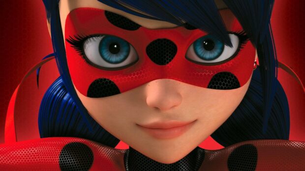 Close up of ladybug character with blue eyes and red mask in animated style