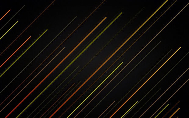 Bright colorful lines forming a dynamic pattern of diagonal lines on a dark background