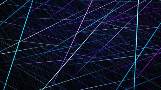 Bright multicolored lines crossing over a dark background with detailed textures