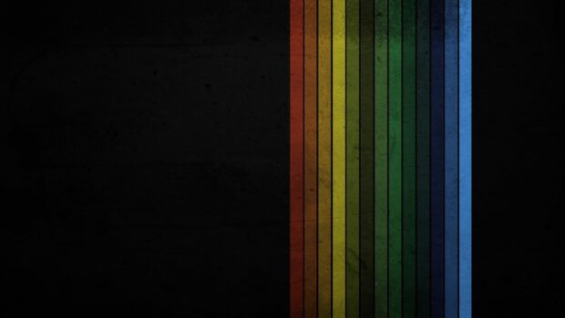Colorful vertical lines arranged on a dark textured background featuring vibrant tones