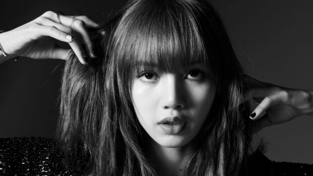 Lisa Blackpink portrait with long hair and bangs in a black and white close up photo