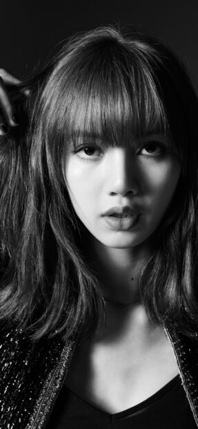 Lisa Blackpink in a close up portrait with long hair and bangs