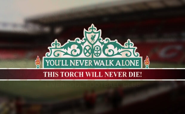 Liverpool Fc Wallpaper 2K Desktop You'll never walk alone signage with Liverpool Fc emblem and torch symbol in stadium background