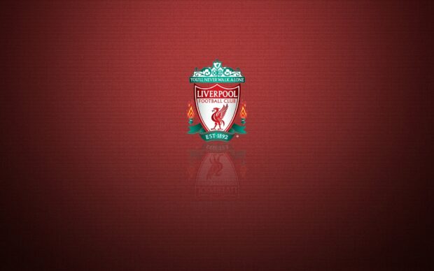 Liverpool football club emblem displayed on dark red background