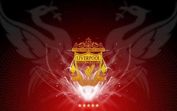 Liverpool football club emblem glowing with golden effects on a red background