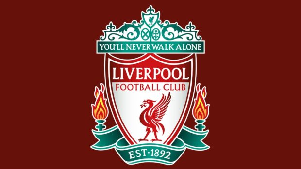 Liverpool football club crest with the established year and motto on a dark red background