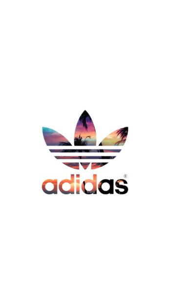 Adidas logo with a colorful sunset and palm tree design inside the logo shape