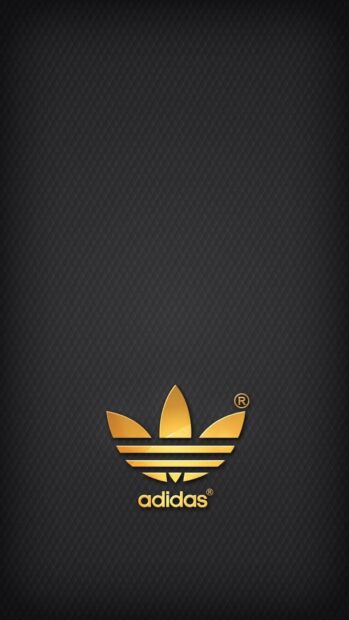 Golden Adidas logo with stylish horizontal lines on a dark textured background
