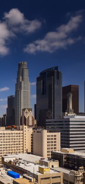 Downtown Los Angeles skyline view with blue sky and tall buildings in high quality