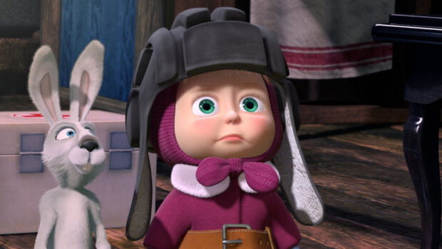 Masha character from Masha And The Bear wearing a black helmet and pink scarf