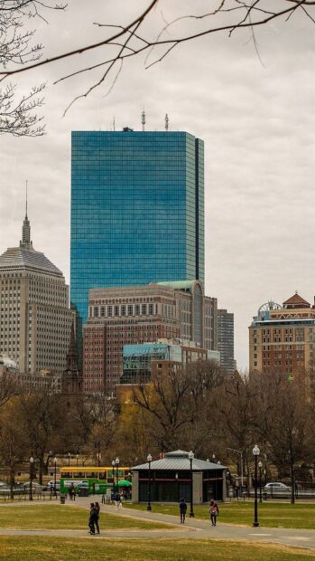 Historic Massachusetts cityscape with modern skyscrapers and park in foreground