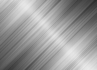 Brushed metal texture with diagonal lines creating a sleek metal surface pattern