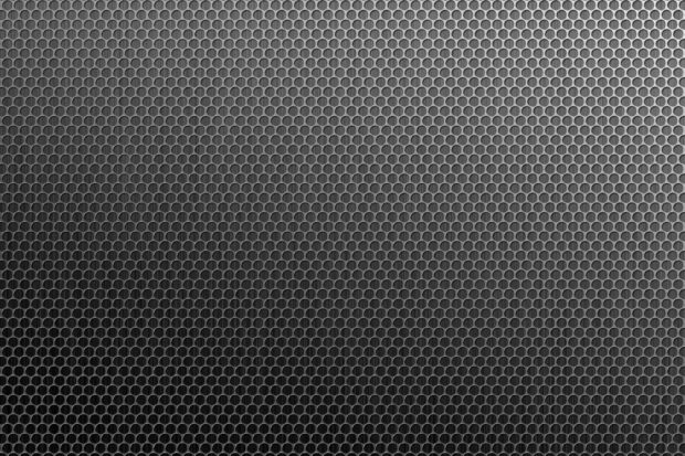 Hexagonal metal texture with dark gradient lighting across the surface