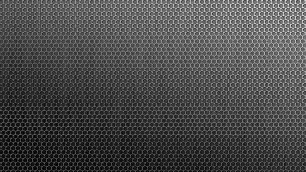 Close up of metal texture with hexagonal pattern and gradient shading