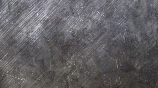 Scratched metal texture with rough and worn steel surface
