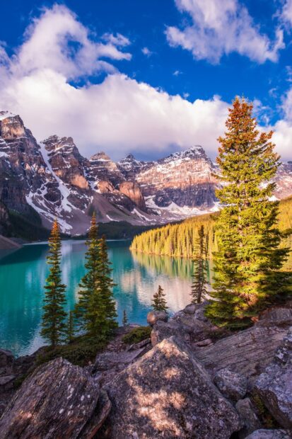 Stunning view of Moraine Lake with turquoise water and mountain peaks in Canada