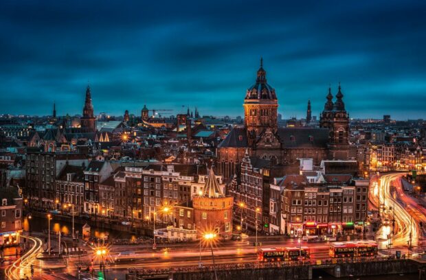 Historic architecture in Netherlands cityscape at dusk showcasing beautiful urban landmarks