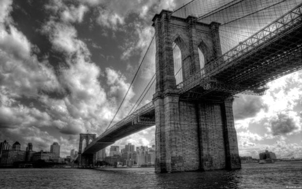 Brooklyn Bridge and New York skyline in black and white HDR cityscape