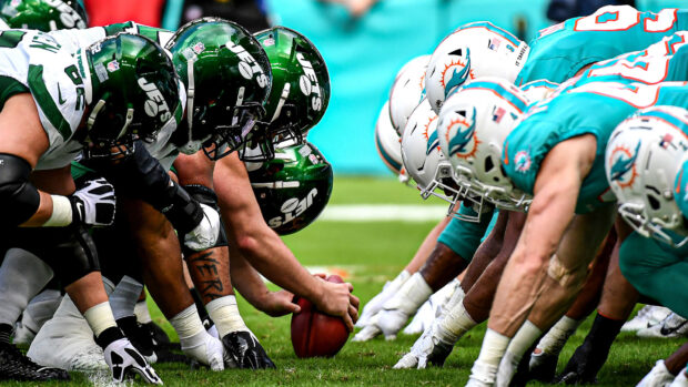 New York Jets players lining up before the snap in a football game