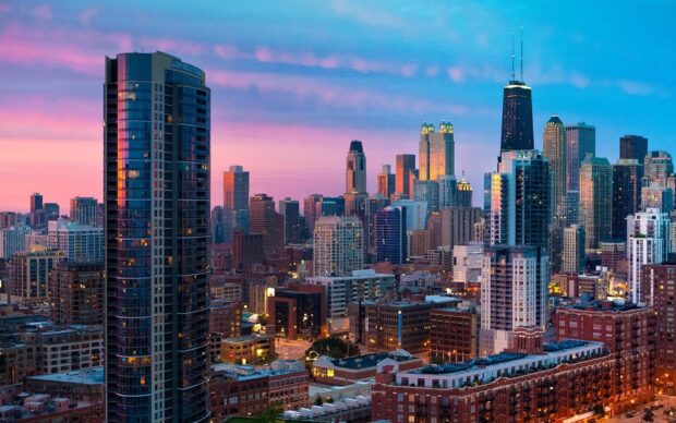 Urban skyline of North America cityscape during sunset with tall buildings and colorful sky