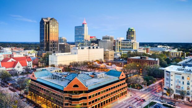 Downtown skyline featuring North Carolina city buildings and urban landscape at sunset
