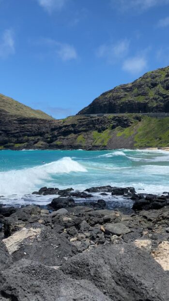Rocky coastline with turquoise ocean waves at Oahu coast