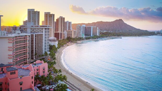 Sunrise over Oahu cityscape with Diamond Head mountain in the background