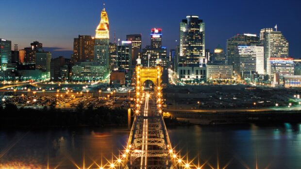 Night view of Ohio cityscape with illuminated bridge and skyline lights