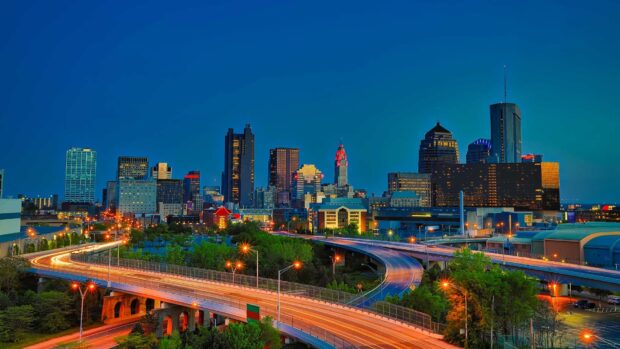 Stunning Ohio cityscape with highways and vibrant skyline at dusk