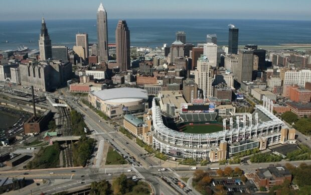 Aerial view of Ohio city skyline with stadium and lake in the background featuring Ohio landmarks