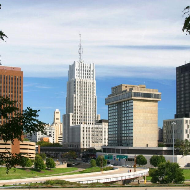 Downtown Ohio cityscape with iconic buildings and clear blue sky