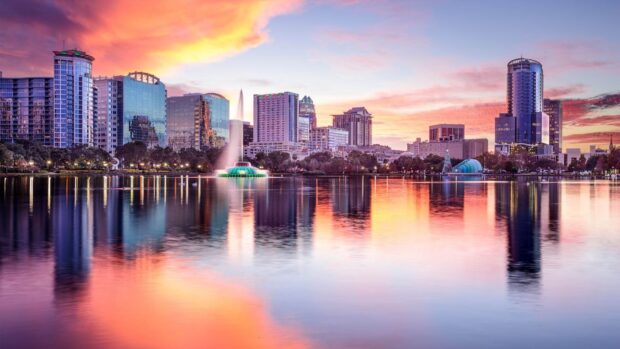 Orlando skyline with sunset reflecting on lake water in high definition