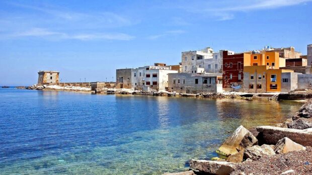 Coastal buildings near clear water in Palermo townscape