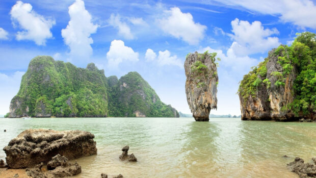 Unique rock formation with lush greenery in Phi Phi natural scenery