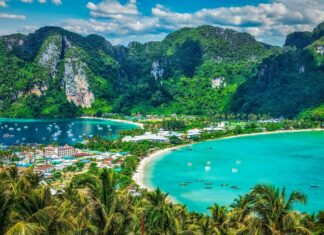 A scenic view of Phi Phi with lush green mountains and turquoise water bay