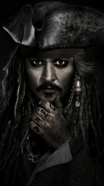 Close up of a pirate character with detailed tattoos and braids from Pirates Of The Caribbean