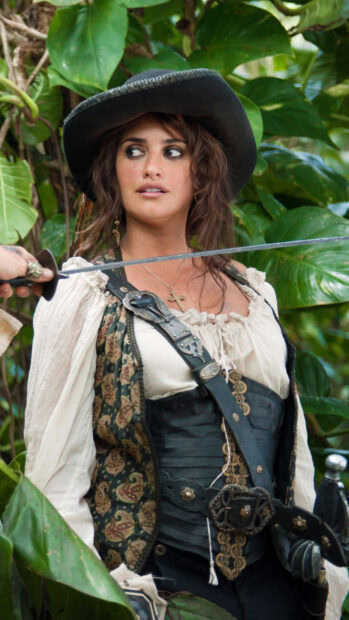 Female pirate character from Pirates of the Caribbean wearing a black hat and corset