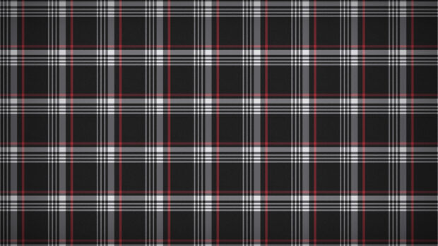 Black plaid pattern with white and red stripes forming square grids
