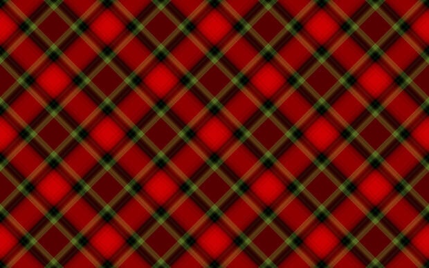 Red and green plaid pattern on fabric with a classic checkered design
