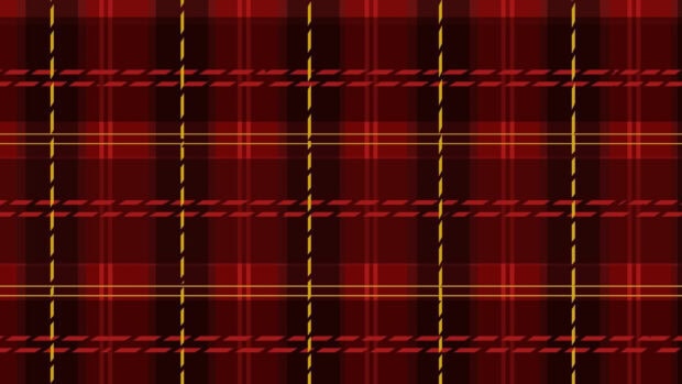 Red and yellow plaid pattern design with intersecting lines and squares