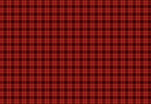 Red checkered plaid pattern with yellow and black lines in a seamless design