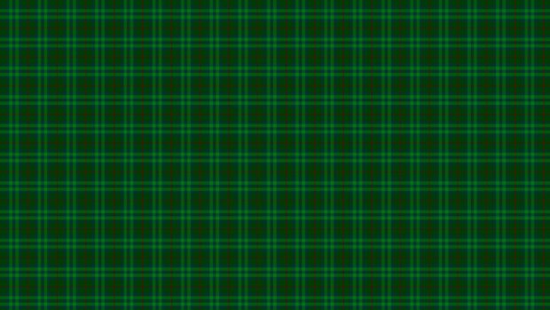 A green plaid pattern with intersecting lines creating a tartan design for desktop
