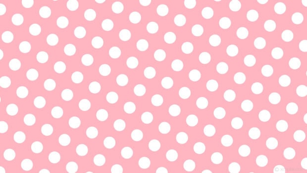 White polka dot pattern on pink color design for polka dot